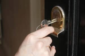 A house key in a front door lock